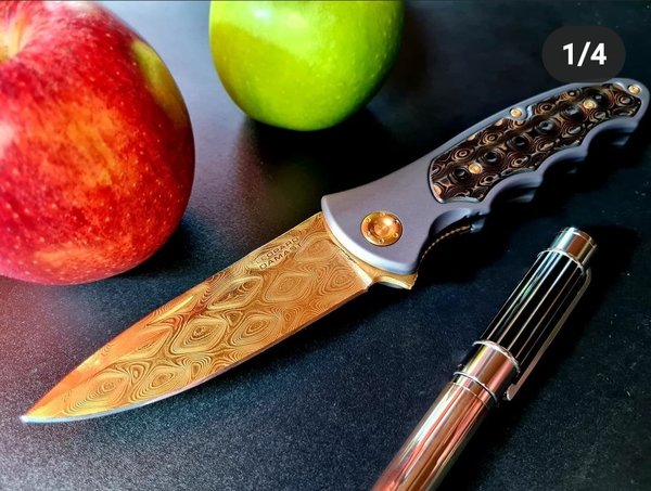 Bild zeigt hochwertige taschenmesser herrenmesser gentleman-messer böker leopard damast
